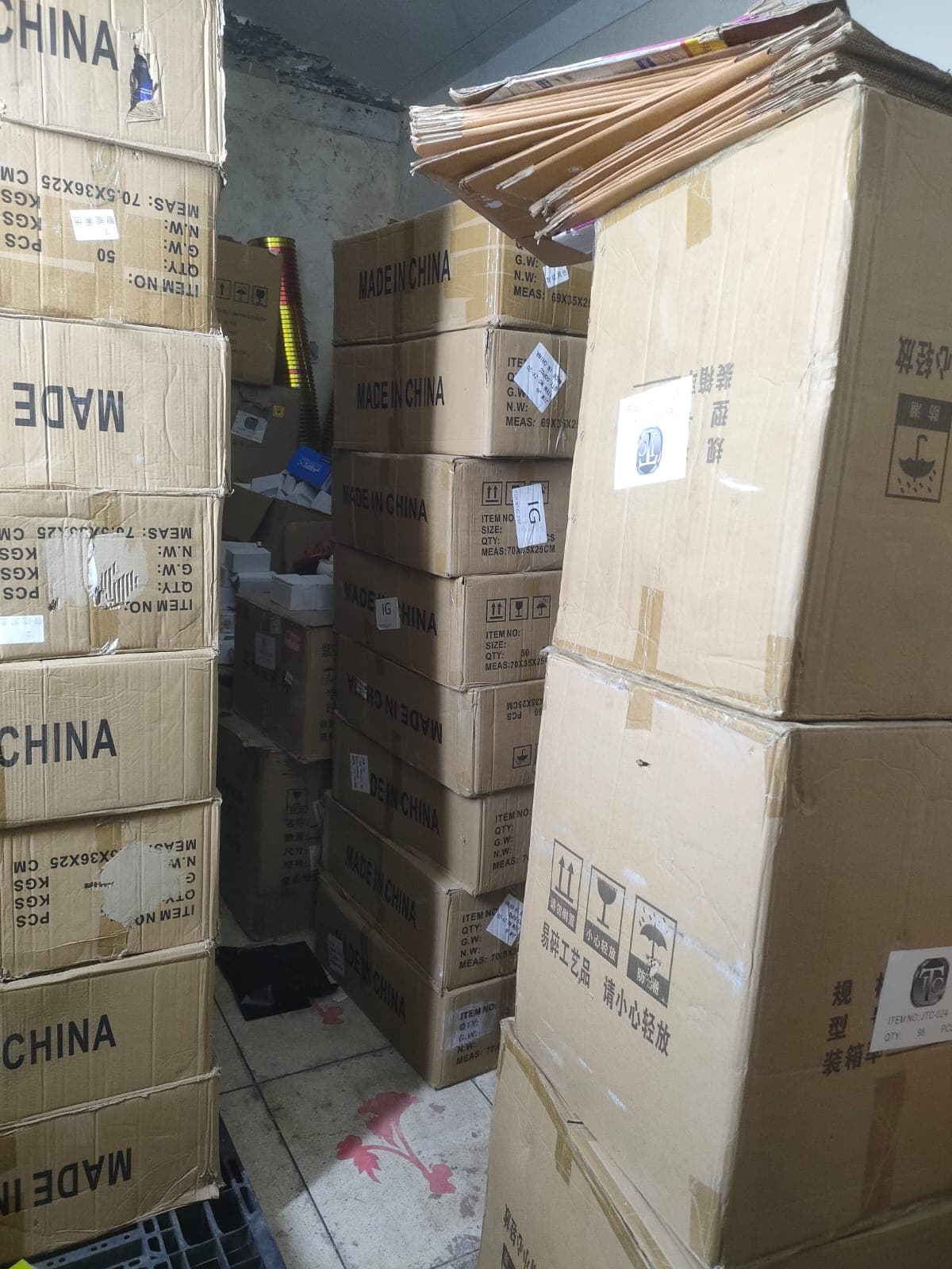 Warehouse aisle with organised product cartons at SimpleCart Store