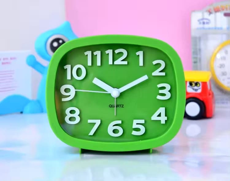 Mini Cartoon Kids Alarm Clock detail view for online shoppers in Pakistan