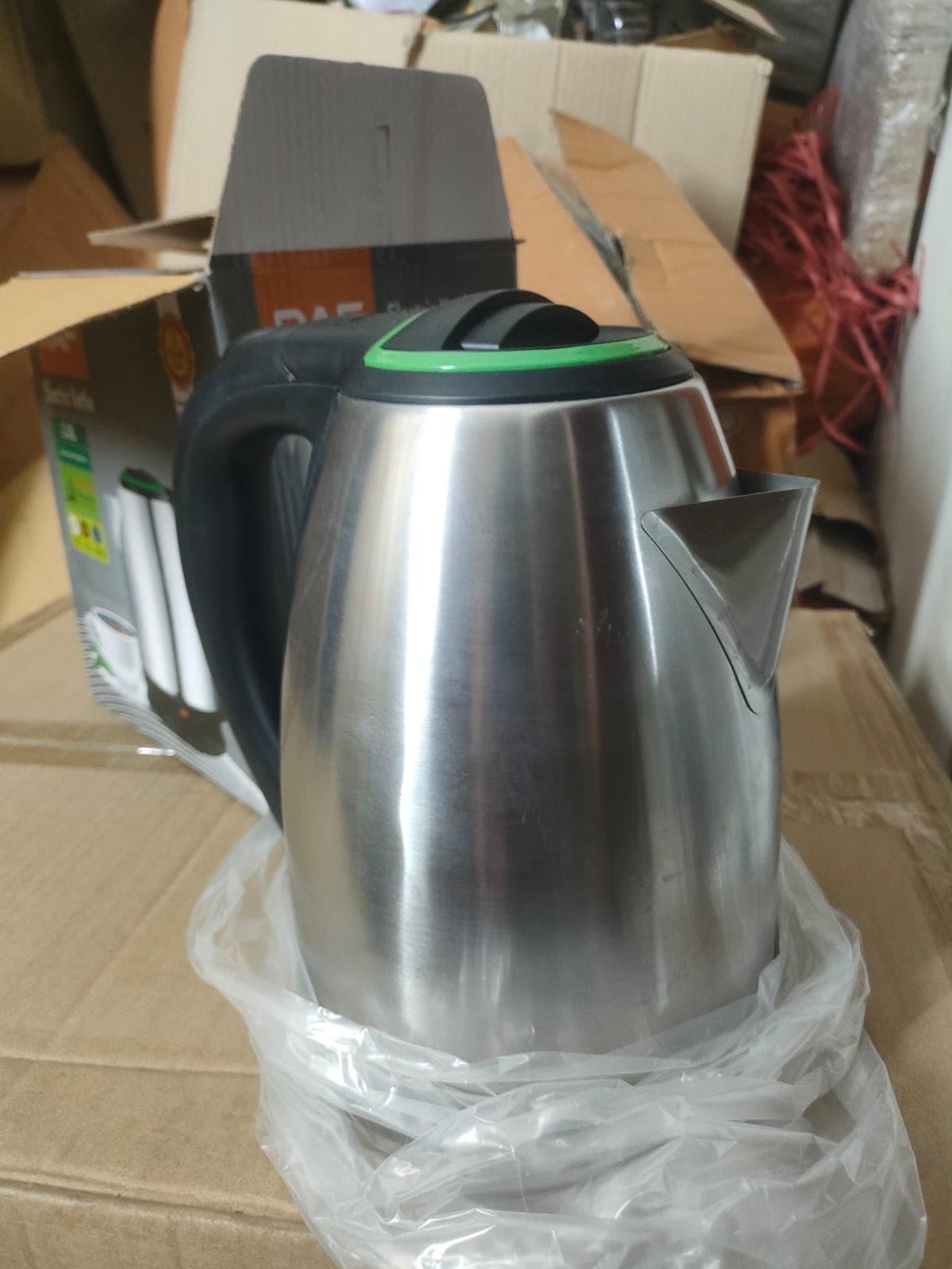 Stainless steel electric kettle prepared for packing at SimpleCart Store